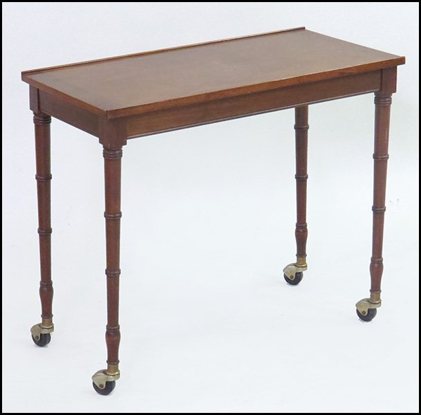 OAK DRAFTING DESK.: OAK DRAFTING DESK. Raised on casters 28'' x 31'' x 15''