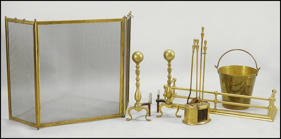 COLLECTION OF BRASS FIREPLACE TOOLS.: COLLECTION OF BRASS FIREPLACE TOOLS. Comprised of a firescreen, a bucket, a pair of andirons, a fire fender, and a set of fire tools Screen H: 30.5''
