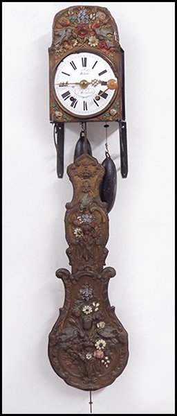 FRENCH PAINTED METAL WALL CLOCK.: FRENCH PAINTED METAL WALL CLOCK. Comprised of a clock which mounts to a pair of brackets, a pendulum, and two weights. Enamel face of clock reads "Heliez a Quimperle" Approximately 50" x 10"