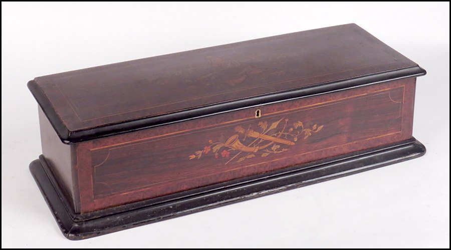 SWISS CYLINDER INLAID MUSIC BOX.: SWISS CYLINDER INLAID MUSIC BOX. 13" single cylinder, hinged lid, burlwood veneer with an inlaid decoration of horns and weapons among foliage, key included 7"x25.5"x9.5"