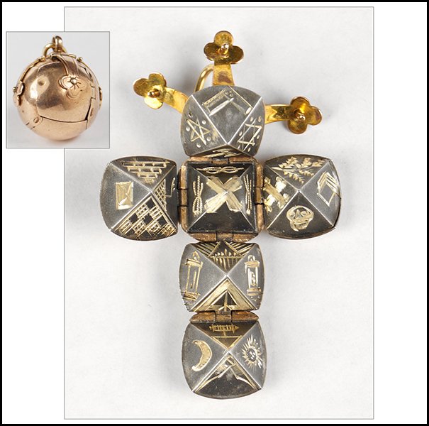 12 KARAT YELLOW GOLD MASONIC BALL PENDANT.: 12 KARAT YELLOW GOLD MASONIC BALL PENDANT. Pendant unfolds to reveal a cross form with Masonic decoration