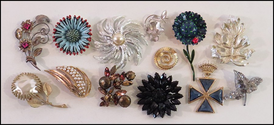 COLLECTION OF SIGNED BROOCHES.: COLLECTION OF SIGNED BROOCHES. Comprised of brooches by Sarah Coventry, Original by Robert, Corocraft, Weiss, BSK, Accessocraft, Regency, Giovanni, Napier, and one sterling silver flower brooch