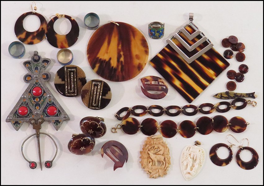 COLLECTION OF FAUX TORTOISE SHELL JEWELRY.: COLLECTION OF FAUX TORTOISE SHELL JEWELRY. Comprised of two link bracelets, two pendants, one pair of cufflinks, three pairs of earrings, two letter brooches, buttons, and a fish form pocket knife. To