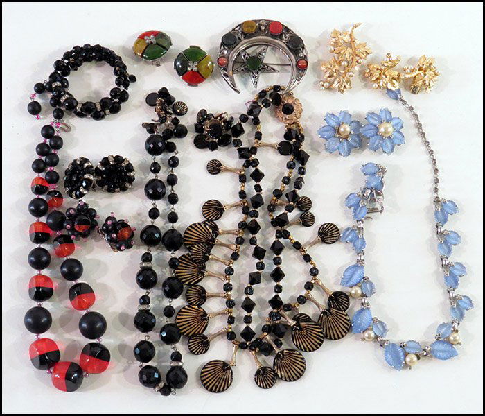 JOMAZ DEMI-PARURE.: JOMAZ DEMI-PARURE. Comprised of a pair of earclips and necklace. Together with a Hobe orange and black necklace and pair of earclips, a Hobe gold tone and faux pearl brooch and earclips, and various b