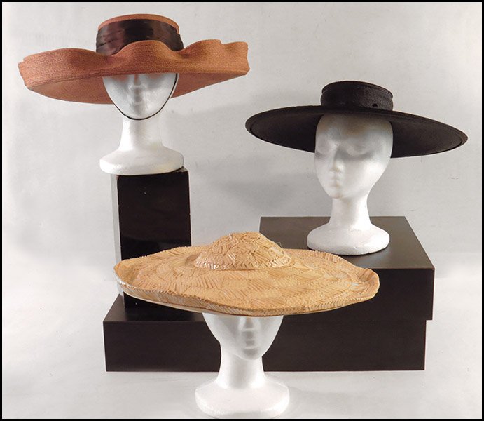 THREE 1940'S ERA SUMMER HATS.: THREE 1940'S ERA SUMMER HATS. Comprised of three leghorn plaited straw hats in black, tan, and white. One by Helkes, a Chicago milliner and one by Weyman's, a California milliner Size: Medium
