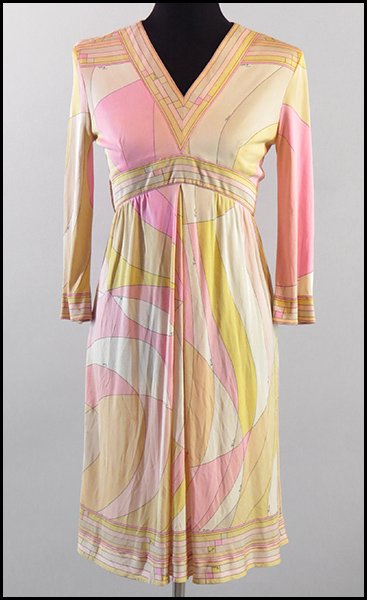 EMILIO PUCCI MULTICOLORED PRINT SILK DRESS.: EMILIO PUCCI MULTICOLORED PRINT SILK DRESS. Made in Italy, exclusively for Saks Fifth Avenue. Bearing three-quarters length sleeves and an a-line. Labeled Size 10