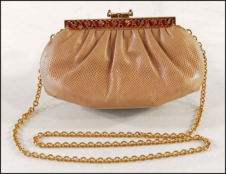 JUDITH LEIBER TAUPE LIZARD SHOULDER BAG.: JUDITH LEIBER TAUPE LIZARD SHOULDER BAG. With a link strap. Bearing beaded decoration along the clasp closure. With dust bag H: 5'' L: 9''