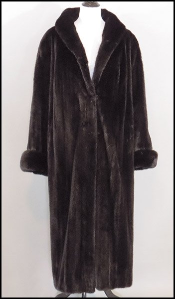 BLACK RANCH MINK FULL-LENGTH COAT.: BLACK RANCH MINK FULL-LENGTH COAT. With a shawl collar and fold over cuffs. Full 93'' sweep Size 16-18