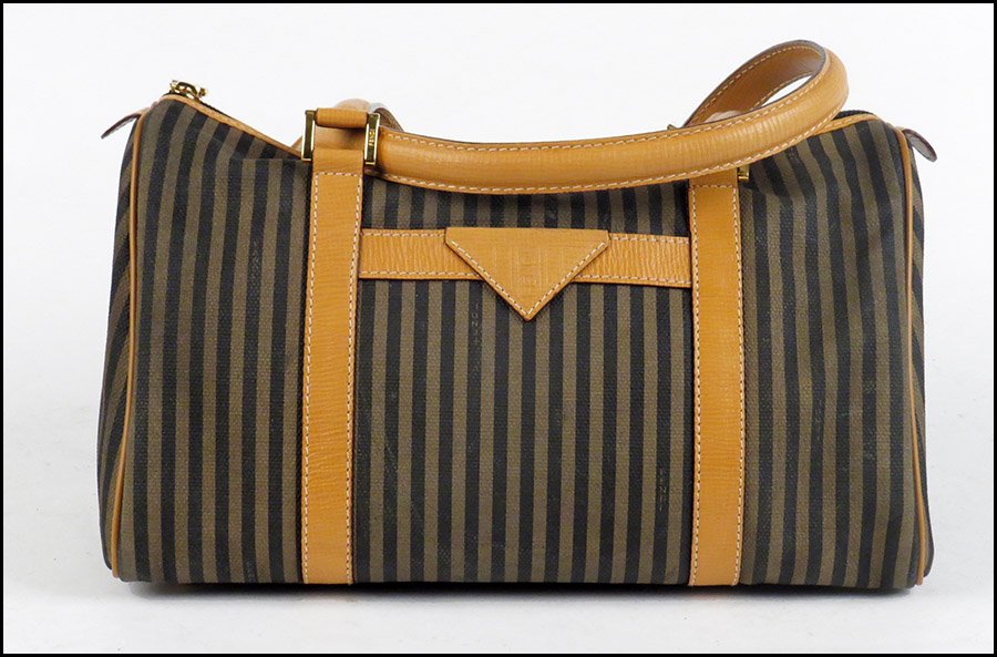 FENDI SPEEDY STYLE LEATHER AND CANVAS HANDBAG.: FENDI SPEEDY STYLE LEATHER AND CANVAS HANDBAG. Interior is stamped with serial number 800-70175-E90. With dustbag Handbag: 7.5" x 12" x 6.5"