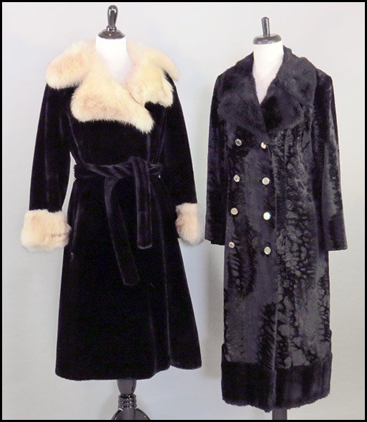 TWO FAUX FUR JACKETS.: TWO FAUX FUR JACKETS. One with a fox collar and self belt. Unlabeled. One Saks Fifth Avenue Borella Both sized small-medium