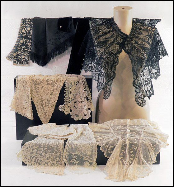 COLLECTION OF BLACK, WHITE, AND CREAM VICTORIAN AND: COLLECTION OF BLACK, WHITE, AND CREAM VICTORIAN AND EDWARDIAN LACES. Comprised of over twenty five collars, berthas, mitts, tippets, and scarves