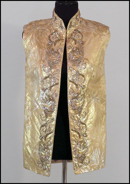 MR. BLACKWELL CUSTOM SILK BROCADE VEST.: MR. BLACKWELL CUSTOM SILK BROCADE VEST. Bearing a Nan Richards label. With beading along the collar and front and silk lining Size: Medium