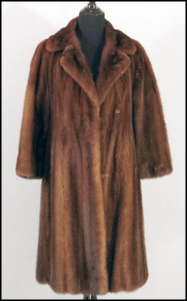 MR. LEONARD BROWN MINK COAT.: MR. LEONARD BROWN MINK COAT. Bearing a knotched lapel Size: Petit small
