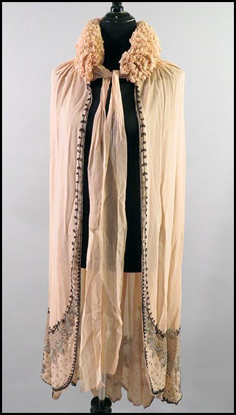 BONWIT TELLER CHIFFON EVENING CAPE.: BONWIT TELLER CHIFFON EVENING CAPE. Handmade in Paris, France. Bearing original "Bonwit, Teller & Co" label. With sequins and beading, From the early 20th century
