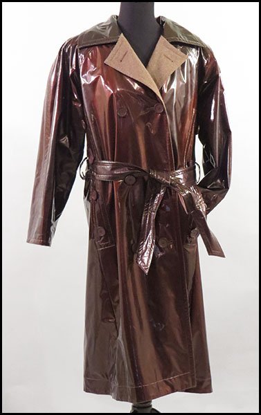 GIVENCHY TRENCH COAT.: GIVENCHY TRENCH COAT. Synthetic exterior, with a wool liner Approximately a size 12