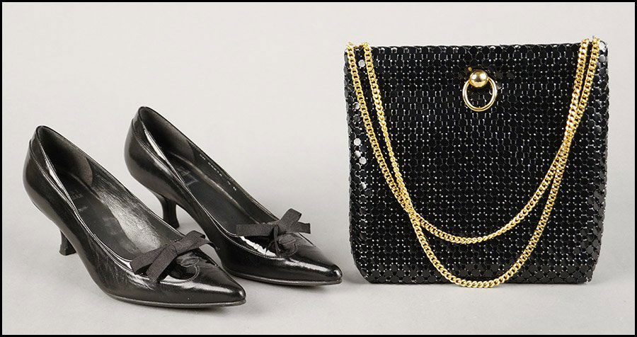 PAIR OF STUART WEITZMAN BLACK LEATHER LOW HEELS.: PAIR OF STUART WEITZMAN BLACK LEATHER LOW HEELS. Together with a black mesh handbag Shoes: size 5