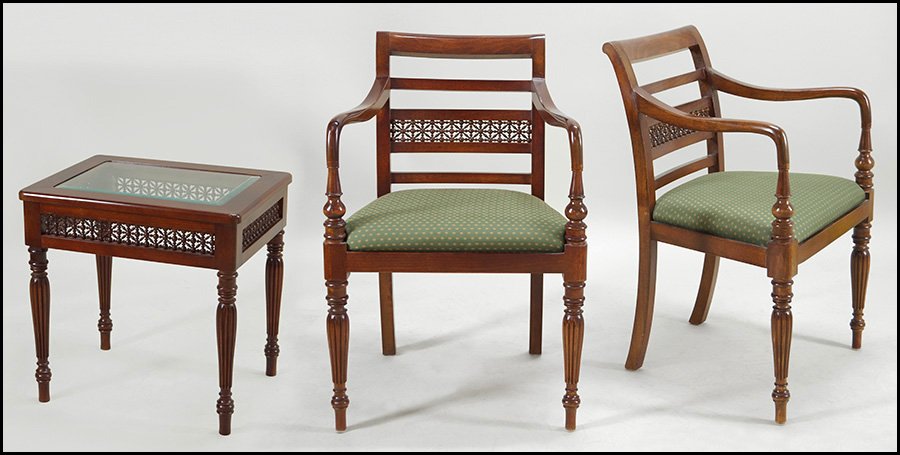 PAIR OF MASHRABIYA MAHOGANY CHAIRS.: PAIR OF MASHRABIYA MAHOGANY CHAIRS. Bearing Jim Thompson striped fabric. Together with a matching inset glass top side table (H: 21''). All unlabeled. From Cairo, Egypt Back H: 34''