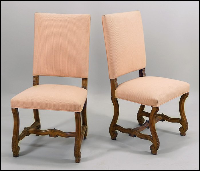 SET OF FIVE UPHOLSTERED OAK DINING CHAIRS.