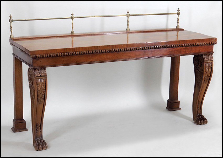 REGENCY STYLE SIDEBOARD.: REGENCY STYLE SIDEBOARD. Raised on paw feet with a brass gallery back and two inset ledges 47" x 79" x 28.5"