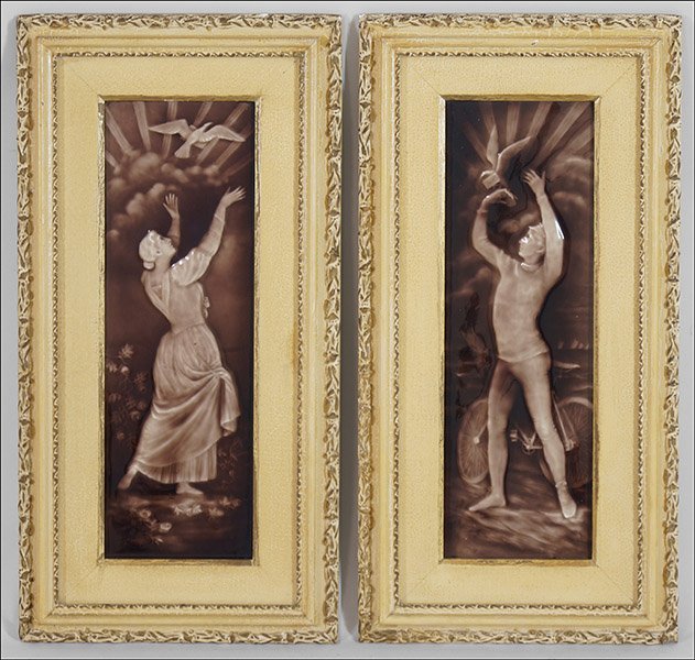 TWO ART TILE COMPANY GLAZED POTTERY TILES.: TWO ART TILE COMPANY GLAZED POTTERY TILES. Each depicting a man and a woman with carrier pigeons transporting messages for the other. Both tiles are marked on the reverse "Art Tile Company, Beaver Fal