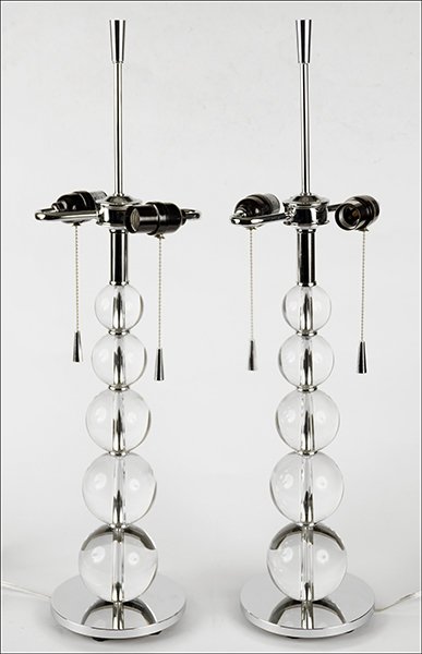 PAIR OF CONTEMPORARY TABLE LAMPS.: PAIR OF CONTEMPORARY TABLE LAMPS. Each comprised of graduated lucite balls leading up to a two-light socket Height: 21"