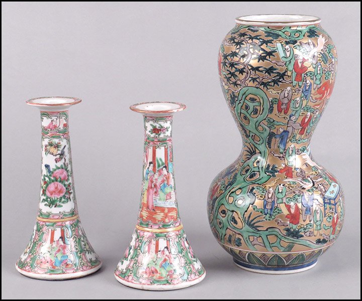 PAIR OF CHINESE FAMILLE ROSE CANDLESTICKS.: PAIR OF CHINESE FAMILLE ROSE CANDLESTICKS. Together with a Chinese painted double gourd vase bearing signature on underside. Candlesticks bear interior scenes and floral decoration Candlestick height: