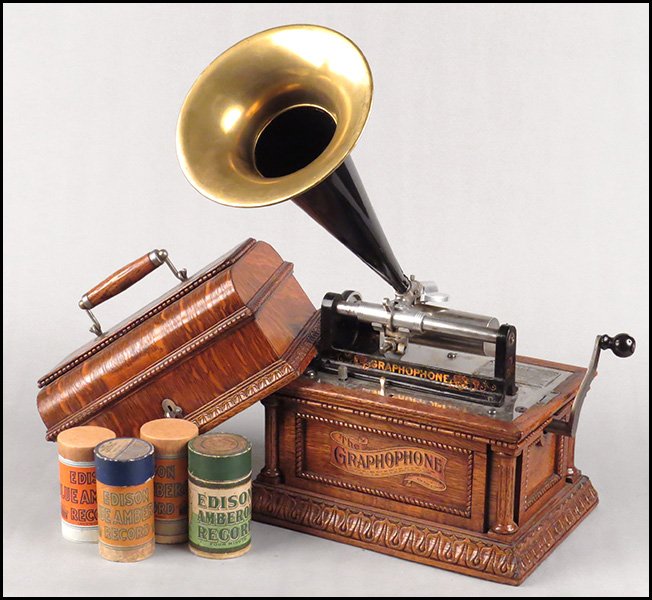 COLUMBIA PHONOGRAPH CO. CYLINDER GRAPHOPHONE.: COLUMBIA PHONOGRAPH CO. CYLINDER GRAPHOPHONE. Together with twenty assorted cylinder records, wind, and horn. Model A O, serial number 271838, dated to 1903 12"x9"x9.5"