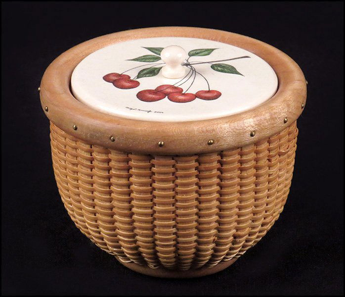 NANTUCKET BASKET WITH SCRIMSHAW LID.