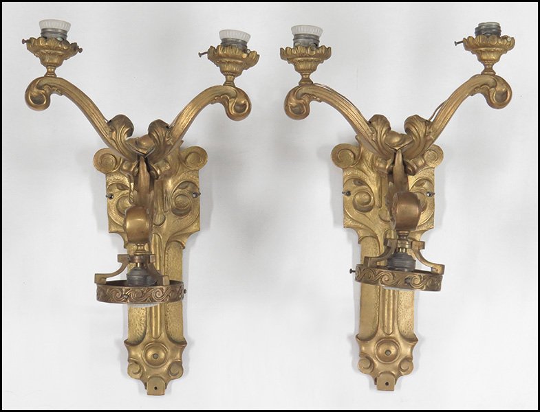 PAIR OF ARTS & CRAFTS THREE-LIGHT WALL SCONCES.: PAIR OF ARTS & CRAFTS THREE-LIGHT WALL SCONCES. Gilt bronze with two lights ascending and a single light descending, wired for electricity 19" x 11.5"