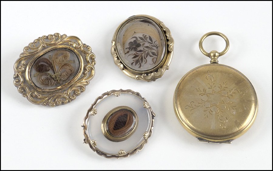 VICTORIAN GOLD FILLED AND MILK AGATE BROOCH.: VICTORIAN GOLD FILLED AND MILK AGATE BROOCH. Together with two Victorian gold filled mourning brooches and a Victorian gold filled pocket watch style mourning locket / pendant Agate brooch: 1" x 1.5"