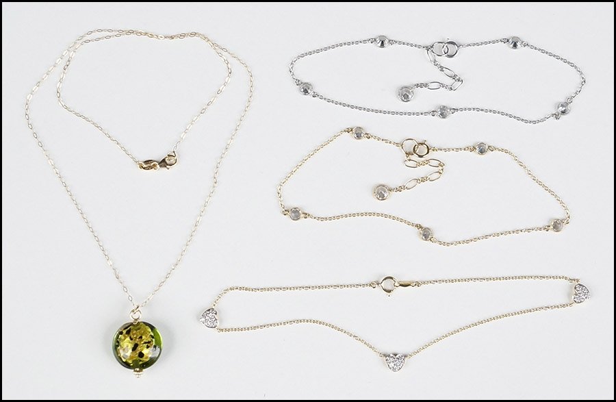 THREE 14 KARAT GOLD ANKLETS.: THREE 14 KARAT GOLD ANKLETS. Each set with cubic zirconia. Together with an Italian 14 karat yellow gold necklace with Venetian glass pendant 5.9 grams