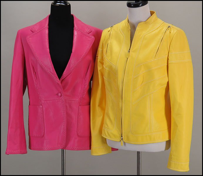 ESCADA LEATHER SINGLE BUTTON BLAZER.: ESCADA LEATHER SINGLE BUTTON BLAZER. Pink, with lining. Together with an Escada leather zipper embellished jacket. Yellow, with silk lining Both size 44