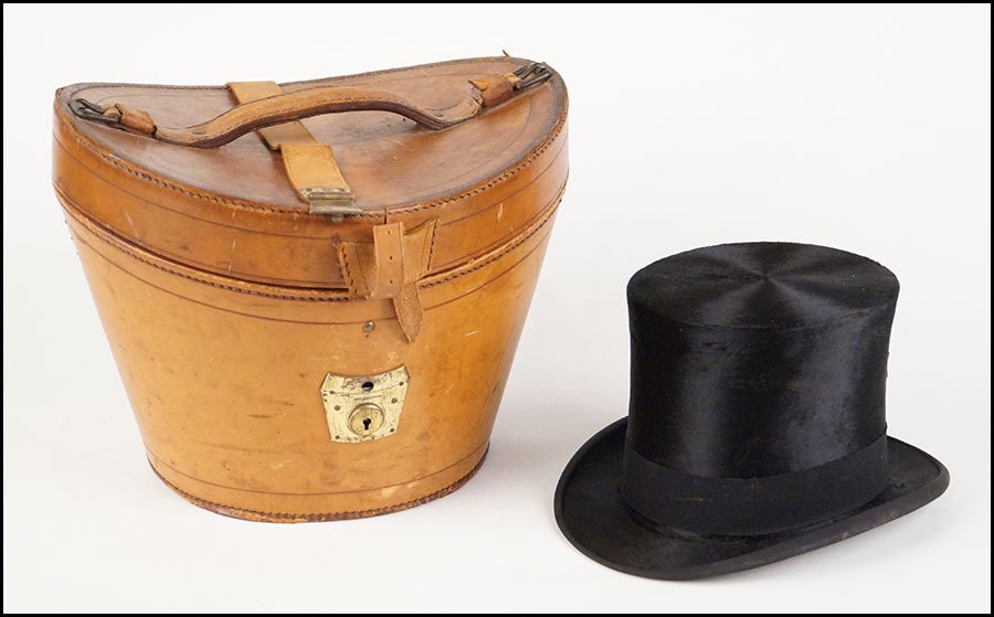 KNOX NEW YORK BLACK BEAVER TOP HAT.: KNOX NEW YORK BLACK BEAVER TOP HAT. In a Chaseland and Company Hatters silk lined leather fitted carrying case. With a Luke Horsefall Company stamp along the interior crown Box: 11'' x 13.5'' x 12.5''