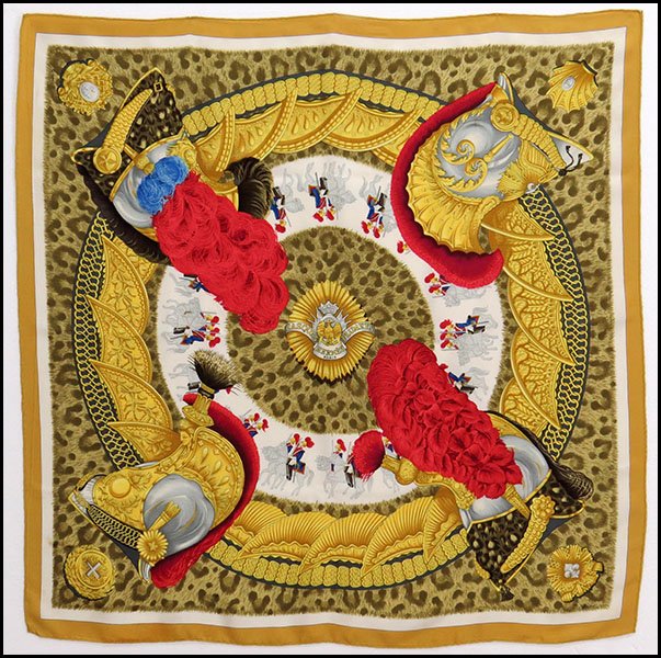 HERMES 'CASQUES ET PLUMETS' SILK SCARF.: HERMES 'CASQUES ET PLUMETS' SILK SCARF. Designed by Julia Abadie. Signed in print LR 36'' x 36''