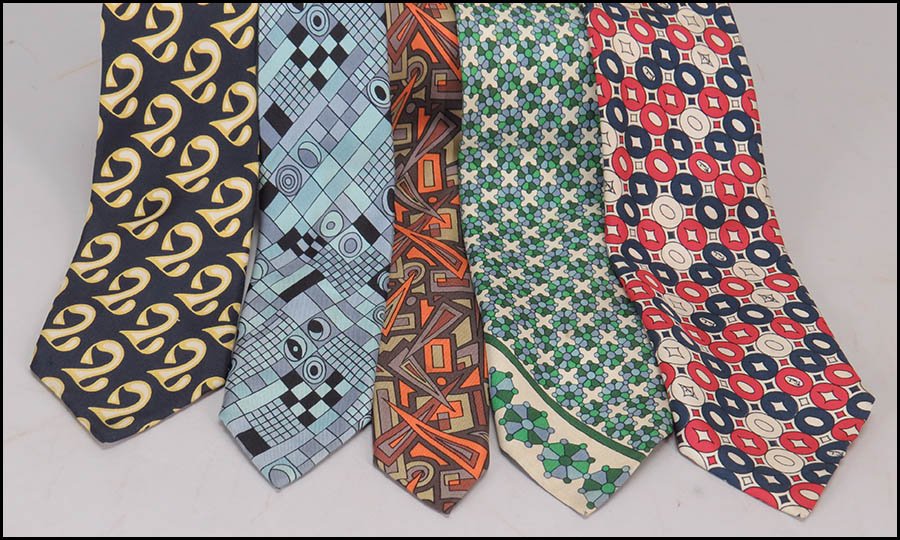 GROUP OF FOUR EMILIO PUCCI SILK TIES.: GROUP OF FOUR EMILIO PUCCI SILK TIES. Comprised of two 'Made in Italy for Saks Fifth Avenue' and two labeled with the 'Emilio Pucci Florence Italy' tags. Together with one Christian Dior Paris silk ti