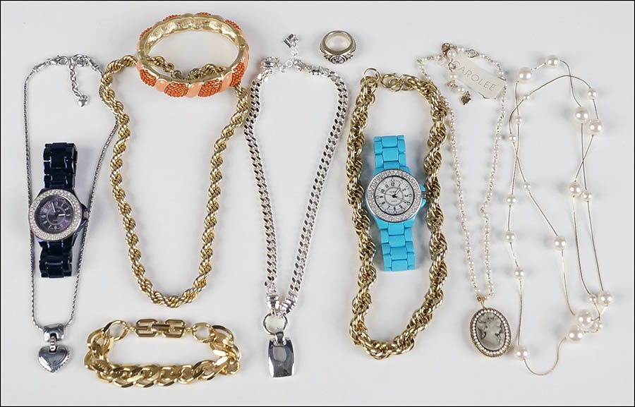 A COLLECTION OF JEWELRY.: A COLLECTION OF JEWELRY. Comprised of two Scoop watches, a Patricia Locke ring, a Givenchy gold tone bracelet, a faux coral bangle bracelet, a Napier gold tone necklace, and various necklaces