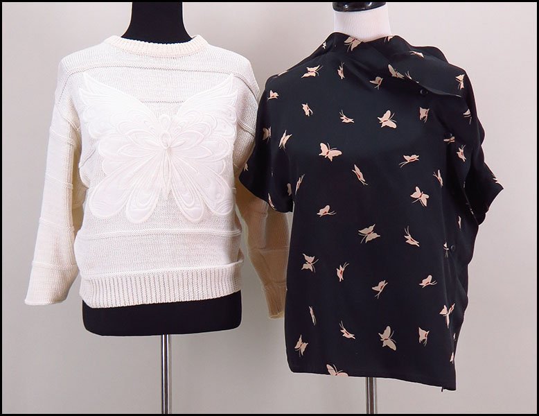 KRIZIA ITALIAN SILK PRINT BLOUSE.: KRIZIA ITALIAN SILK PRINT BLOUSE. Bearing a butterfly motif. With short sleeves. Together with an Escada white knit sweater, bearing a butterfly within the knit (size unlabeled) Blouse size: 42