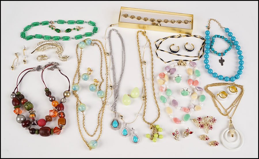 COLLECTION OF DEMI-PARURES.: COLLECTION OF DEMI-PARURES. Comprised of over ten demi-parures of necklaces with earrings or necklaces with bracelets. One set in the form of feathers signed "Coro," lime green bead set signed "Rochel