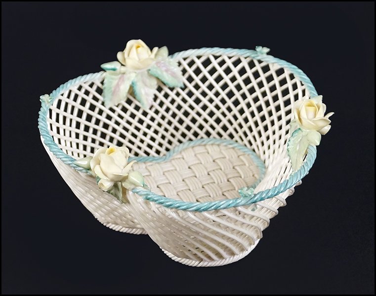 BELLEEK PORCELAIN BASKET.: BELLEEK PORCELAIN BASKET. Four-strand basket trefoil form basket bearing applied painted flowers, painted rim, and painted rim of the bed. Underside is impressed with the Belleek 4th period mark 2.5"