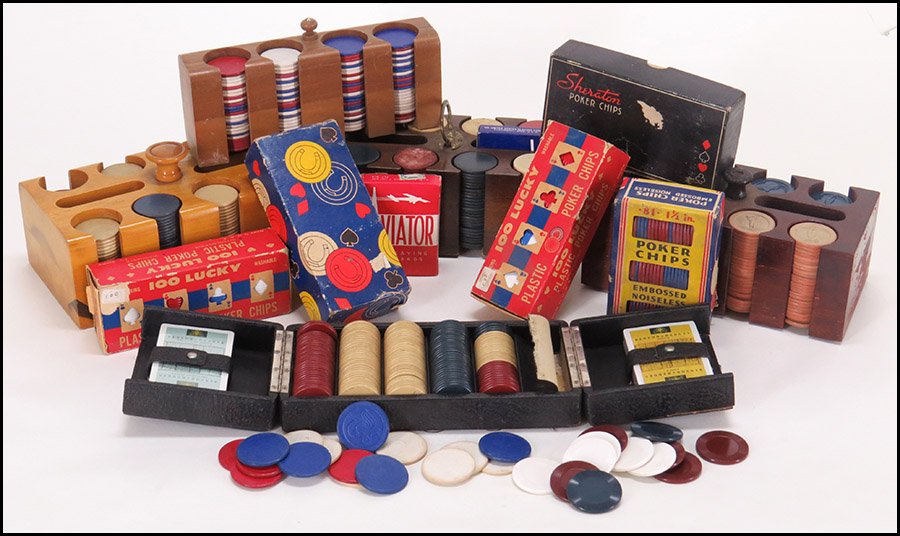 COLLECTION OF POKER AND GAMING CHIPS.: COLLECTION OF POKER AND GAMING CHIPS. Including four wood caddies, a leather case with chips and two packs of playing cards, Clarion paper poker chips with an impressed rooster mark, embossed noiseles