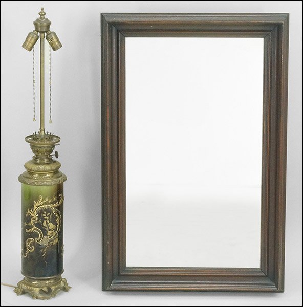 CARVED WOOD MIRROR.: CARVED WOOD MIRROR. Together with a table lamp (Lamp H: 20'') Mirror: 34.5'' x 22.5''