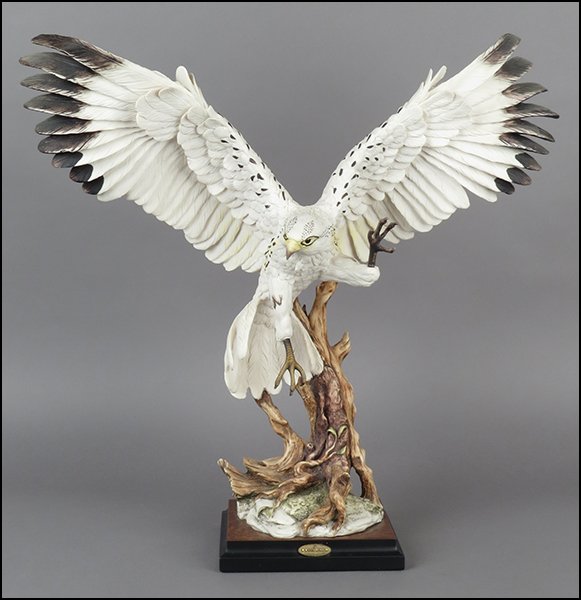 GIUSEPPE ARMANI 'WHITE HAWK' FIGURE.: GIUSEPPE ARMANI 'WHITE HAWK' FIGURE. Signed. Copyright Florence 1988. Bearing the Capodimonte 'N' crown stamp. Raised on a base (1.25'' x 7'' x 7''). With original box 20'' x 22'' x 6.75''