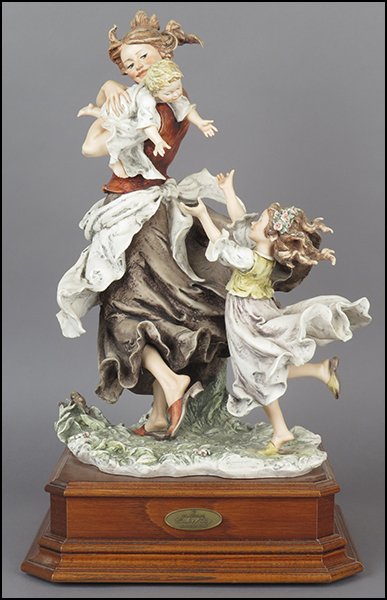 GIUSEPPE ARMANI 'CIRCLE OF JOY' MASTERWORKS FIGURAL: GIUSEPPE ARMANI 'CIRCLE OF JOY' MASTERWORKS FIGURAL GROUP. Signed in two places on the sculpture. Limited edition no. 424/1500. Copyright Florence 1997. Bearing the Capodimonte 'N' crown stamp. Raised