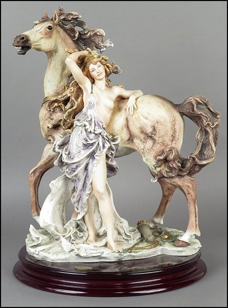 GIUSEPPE ARMANI 'ARTEMIS' FIGURAL GROUP.: GIUSEPPE ARMANI 'ARTEMIS' FIGURAL GROUP. Signed on the sculpture. Limited edition no. 156/5000. Copyright Florence 1996. Bearing the Capodimonte 'N' crown stamp. Raised on a base (H: 1.75'' Diameter: