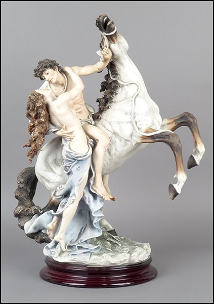 GIUSEPPE ARMANI 'THE EMBRACE' FIGURAL GROUP.: GIUSEPPE ARMANI 'THE EMBRACE' FIGURAL GROUP. Signed twice on the sculpture. Edition no. 895/3000. Copyright Florence 1995. Bearing the Capodimonte 'N' crown stamp. Raised on a base (H: 1.75'' Diameter