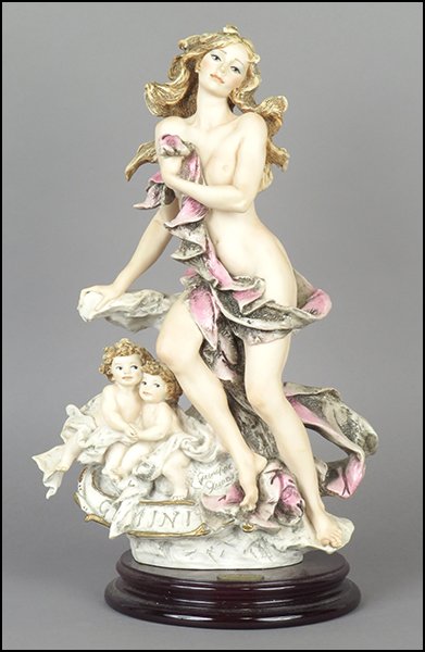 GIUSEPPE ARMANI 'GEMINI' FIGURE.: GIUSEPPE ARMANI 'GEMINI' FIGURE. From the Zodiac series. Signed twice on the sculpture. Edition no. 979/5000. Copyright Florence 1995. Bearing the Capodimonte 'N' crown stamp. Raised on a base (H: 1.5
