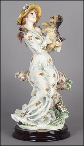 GIUSEPPE ARMANI 'LUCIA' FIGURE.: GIUSEPPE ARMANI 'LUCIA' FIGURE. A member's only 1998 release redemption edition. Signed on the sculpture. Copyright Florence 1997. Bearing the Capodimonte 'N' crown stamp. Raised on a wood base (H: 1'