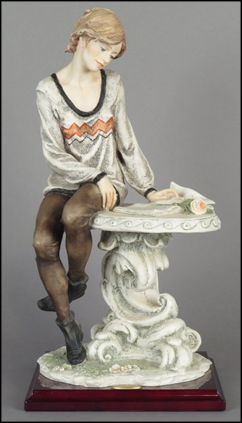 GIUSEPPE ARMANI 'POETRY' FIGURE.: GIUSEPPE ARMANI 'POETRY' FIGURE. Signed on the sculpture. Limited edition no. 75/5000. Copyright Florence 1998. Bearing the Capodimonte 'N' crown stamp. Raised on a wood base (.75'' x 8'' x 8''). With