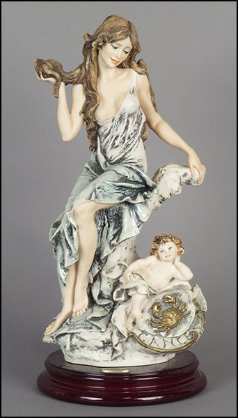 GIUSEPPE ARMANI 'CANCER' FIGURE.: GIUSEPPE ARMANI 'CANCER' FIGURE. From the Zodiac series. Signed on the sculpture. Limited edition no. 979/5000. Copyright Florence 1998. Bearing the Capodimonte 'N' crown stamp. Raised on a wood base 