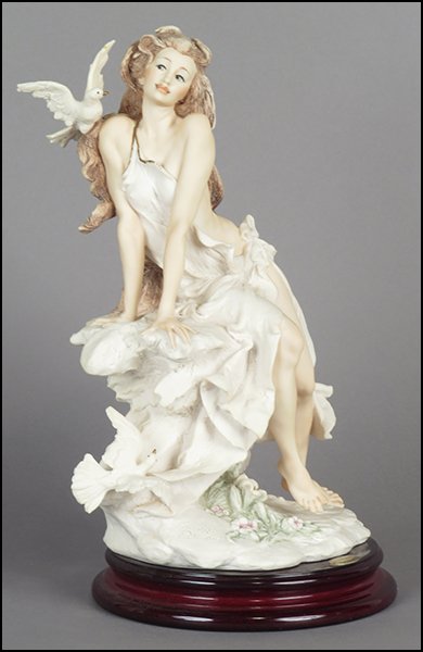 GIUSEPPE ARMANI 'MINERVA' FIGURE.: GIUSEPPE ARMANI 'MINERVA' FIGURE. Signed on the sculpture. Copyright Florence 1994. Bearing the Capodimonte 'N' crown stamp.Raised on a wood base (H: 1.75'' Diameter: 7''). With original box Figure H: